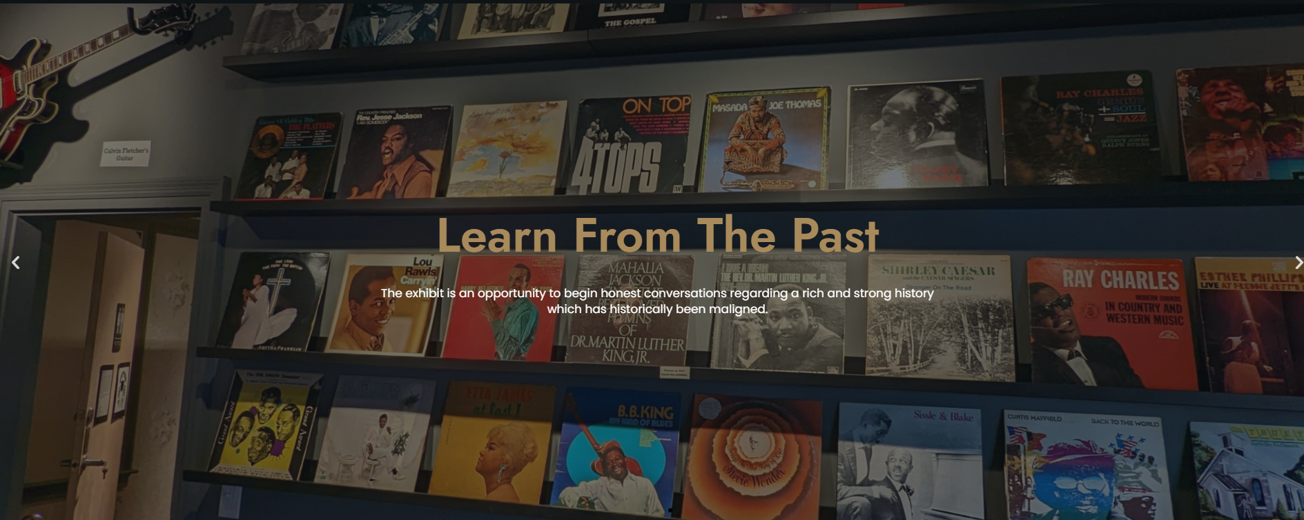 Wall of vinyl records from African American musical history